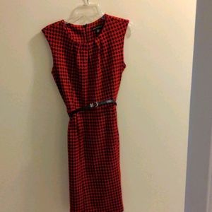 Knee length houndstooth print dress